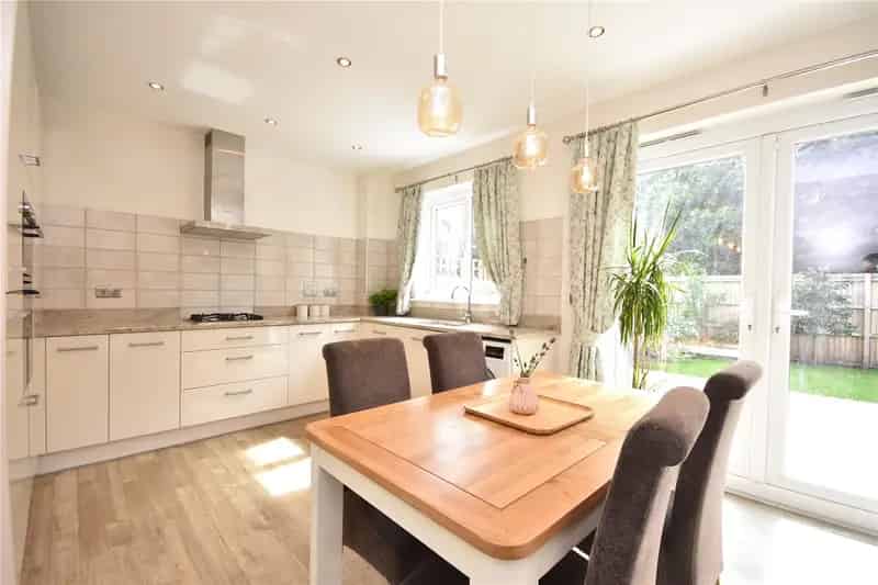 Stunning End Terraced Family Home in Sought-After Development