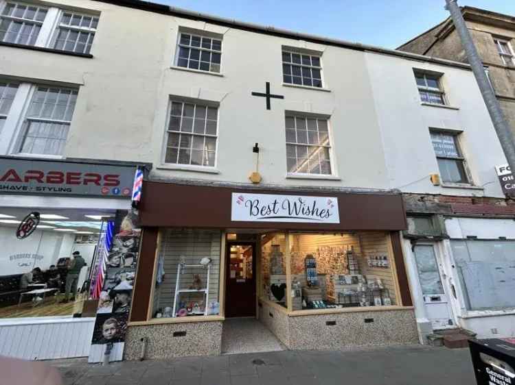 Grade II Listed 3-Floor Commercial Property with Stores and Sales Areas