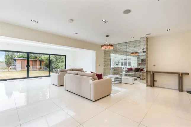 Detached house to rent in Coombe Gardens, London SW20