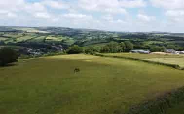 12.98 Acres of Grassl and with Shared Water Access near Exmoor
