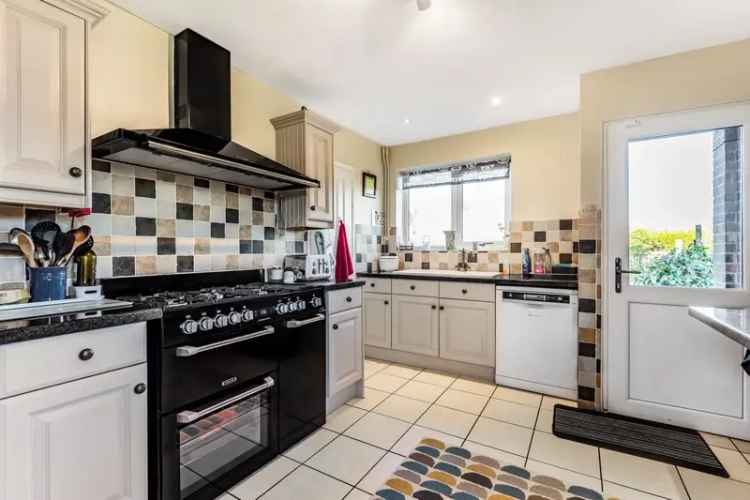 Spacious Family Home with Garden and Detached Garage