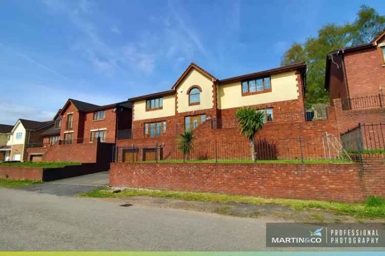 Detached house For Sale in Treharris, Wales