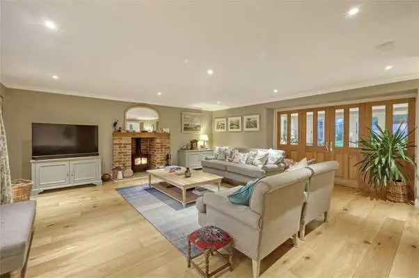 Spacious Family Home with Landscaped Gardens and Double Garage