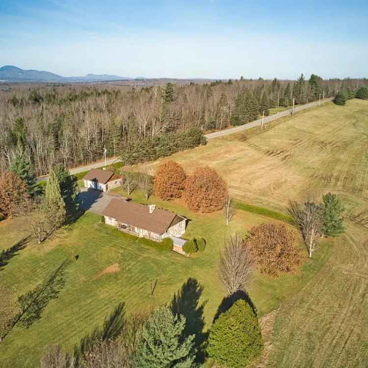 65+ Acres Magog Residential Land with House Mountain Views