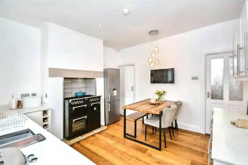 Modernized Terraced Home in Pudsey with Off-Street Parking and Landscaped Gardens