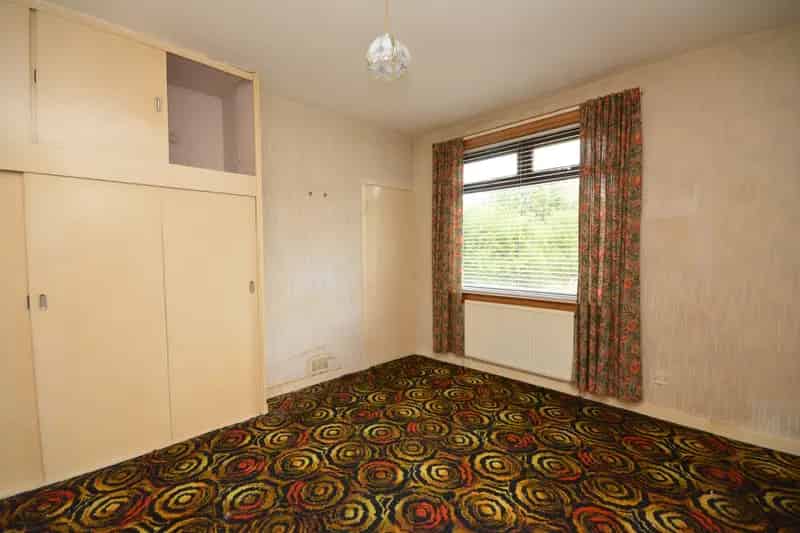 Modernizable Lower Cottage Flat with Private Gardens and Unrestricted Parking