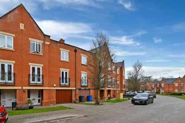 Modern Townhouse in Gated Development with Parkland Views