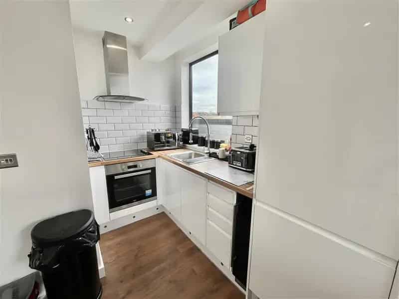 Executive Apartments with Integrated Appliances and Luxury Finishes