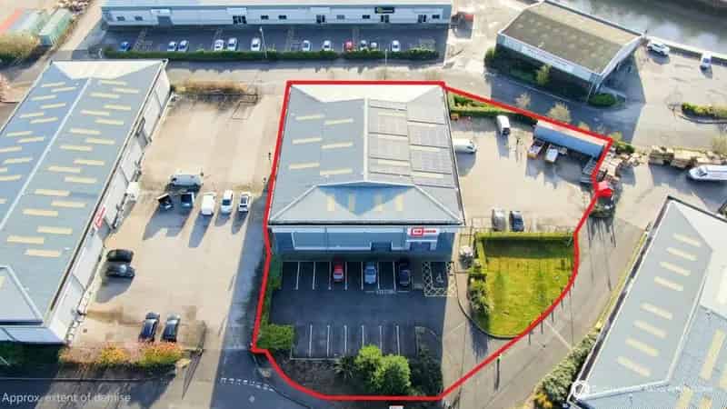 Industrial Unit with Solar Panels and EV Charging