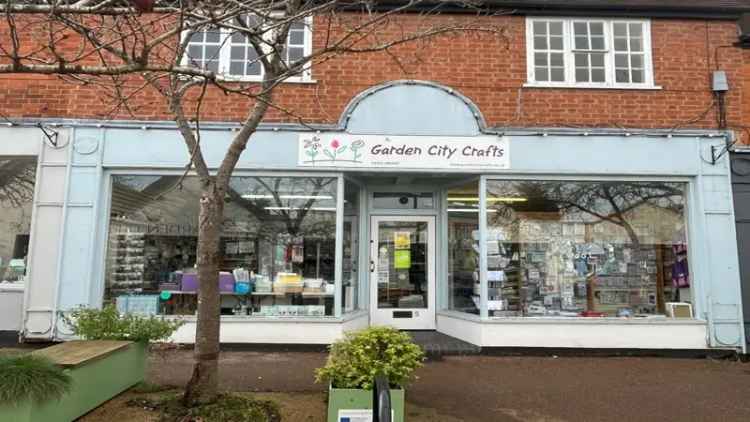 Mid Terrace Retail Unit with Parking