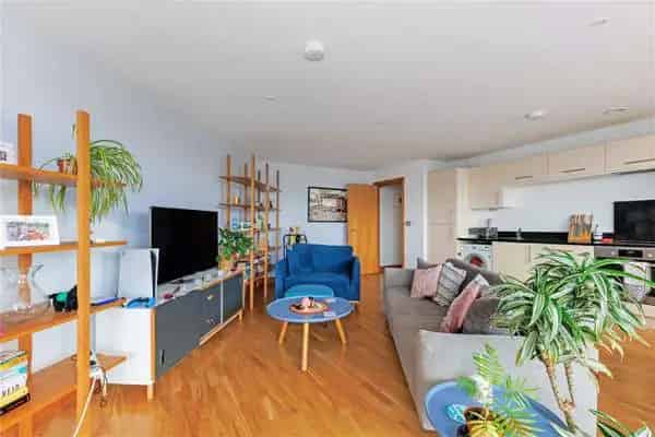 Two-Bedroom Canal-Side Apartment with Balcony and Parking
