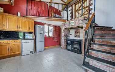 Spacious Barn Conversion with Triple Garage and Stunning Rural Views