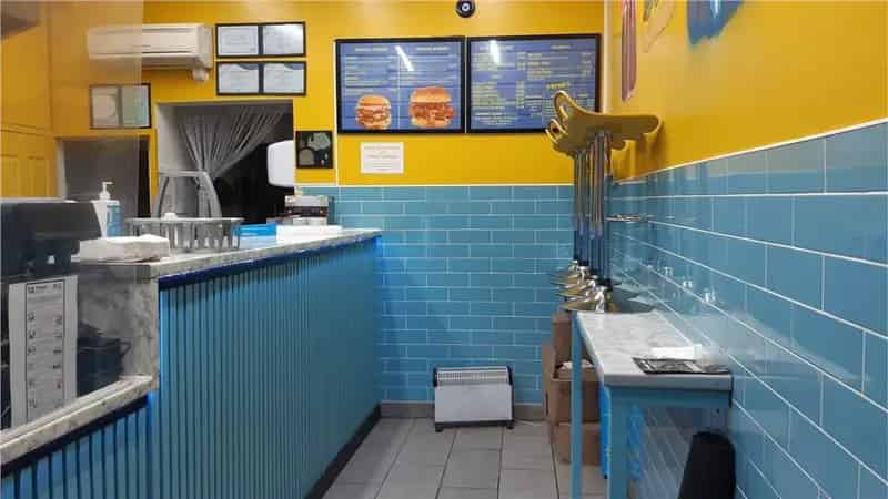 Three-Storey Takeaway with Two Apartments