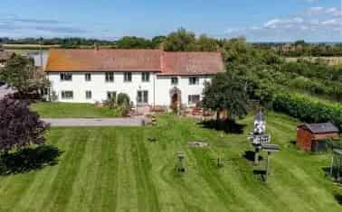 Spacious Farmhouse with Cottage and Outbuildings
