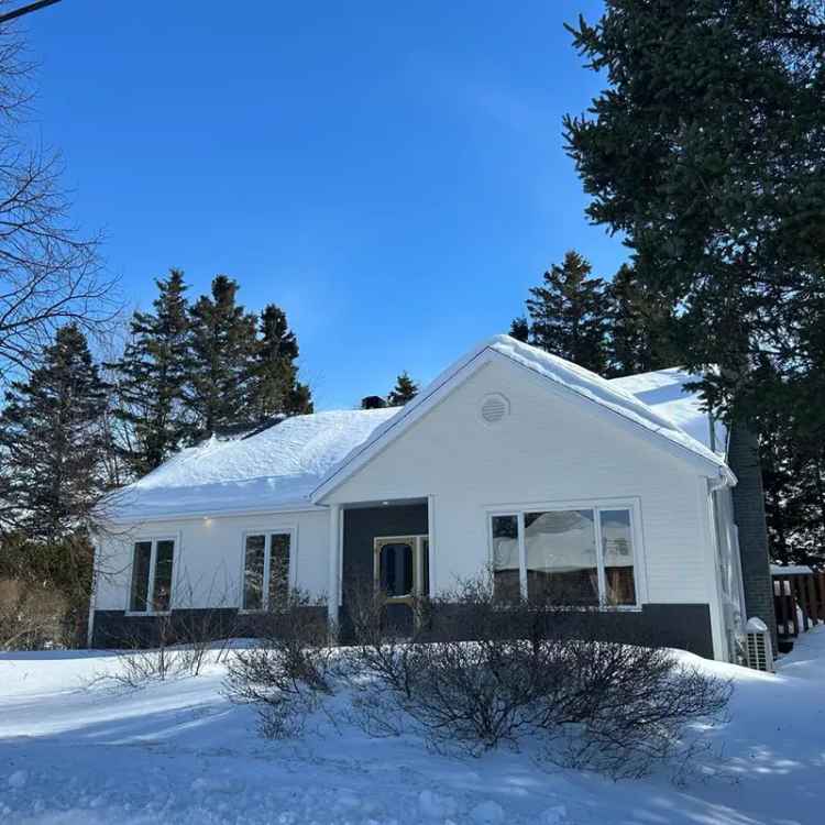 4-Bedroom House with Finished Basement and Sunny Backyard