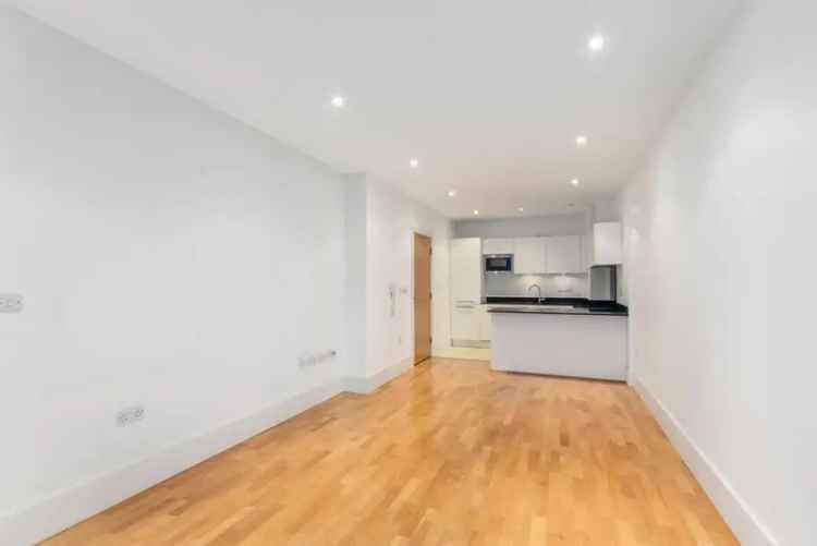 Riverside One-Bedroom Apartment with Balcony and Parking