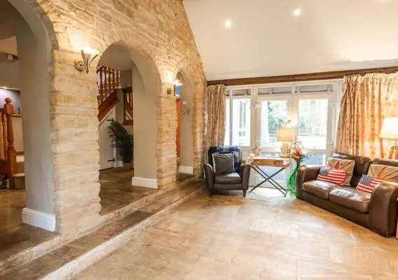 Historic 5-Bedroom House with River Views and Outbuildings