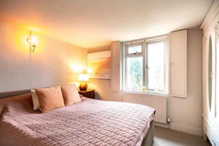 Charming 1850s Period Property with Garden and Converted Garage