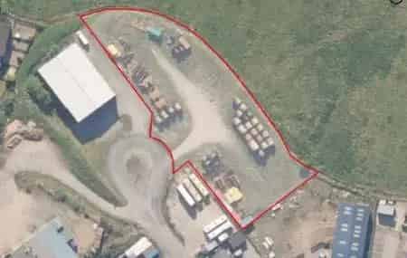 Secure Storage Yard with Steel Gates and Chain Link Fence