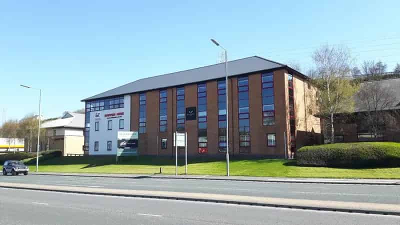 Modern Three-Story Office Building with Ample Parking
