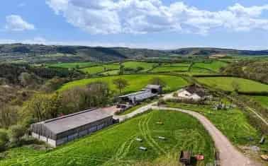 Family Home near Dunsford with 22.22 Acres