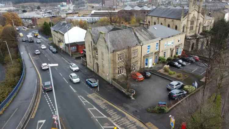 Three Story Stone Office Building with Parking