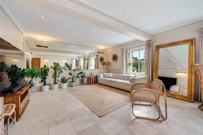 Spacious Riverside Duplex Apartment with Stunning Views and Private Balcony