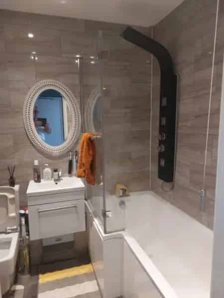 2 Bed First Floor Flat Near A13 with Private Garden and Parking