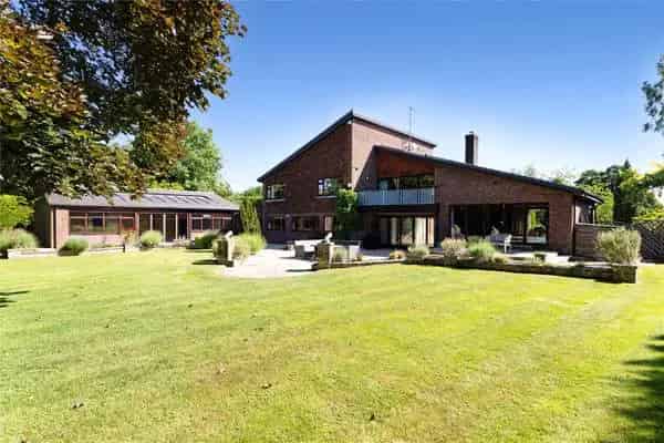 Luxury 4-Bedroom Family Home with Indoor Pool and Extensive Gardens