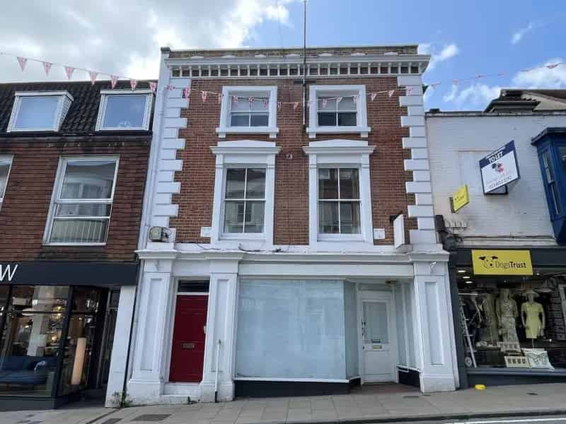 Grade II Listed Commercial Unit with Flats in Winchester High Street