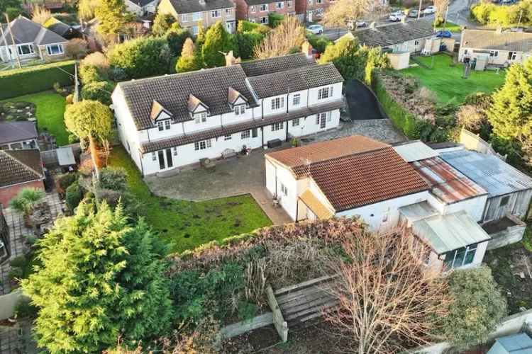 Spacious Family Home with Large Garden and Garages
