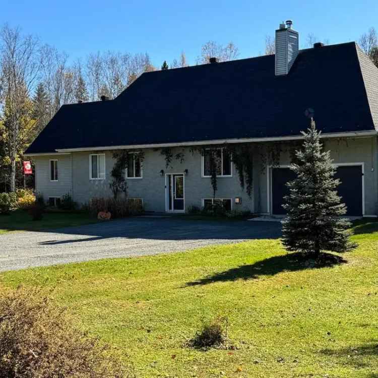 20.4 Acre Waterfront Bungalow with Subdivision Potential