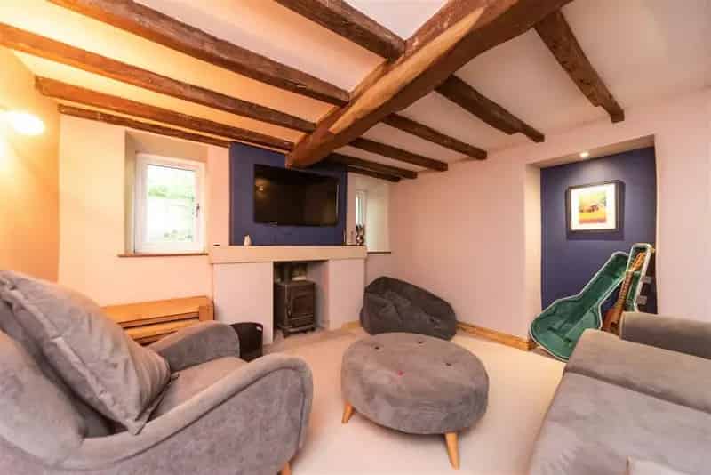 Spacious 5-Bedroom Detached House with Outbuildings and Land