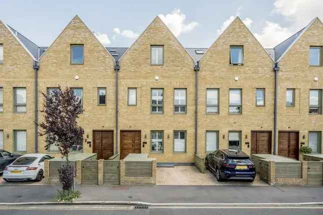 Terraced house for sale in Montague Road, London SW19