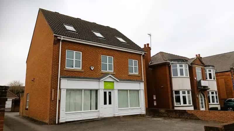 Three Story Office Building with Ample Parking