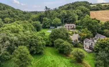 Riverfront Estate with 3 Holiday Cottages and Main Residence