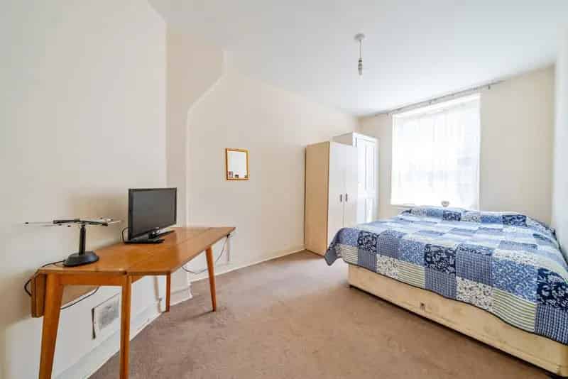 Two-Bedroom Apartment with Private Balcony and Communal Gardens
