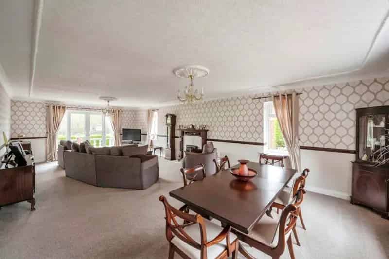 Spacious Family Home with Extensive Gardens and Double Garage