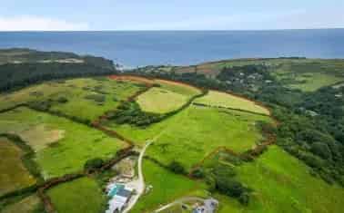 Farmland with Buildings and Coastal Views - 33.6 Acres
