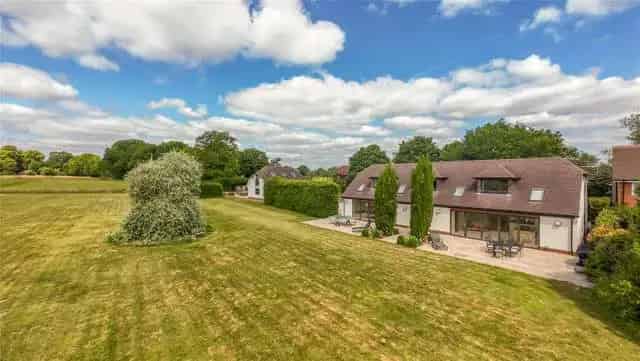 Spacious 5-Bedroom Home with 1.5-Acre Garden and Gym