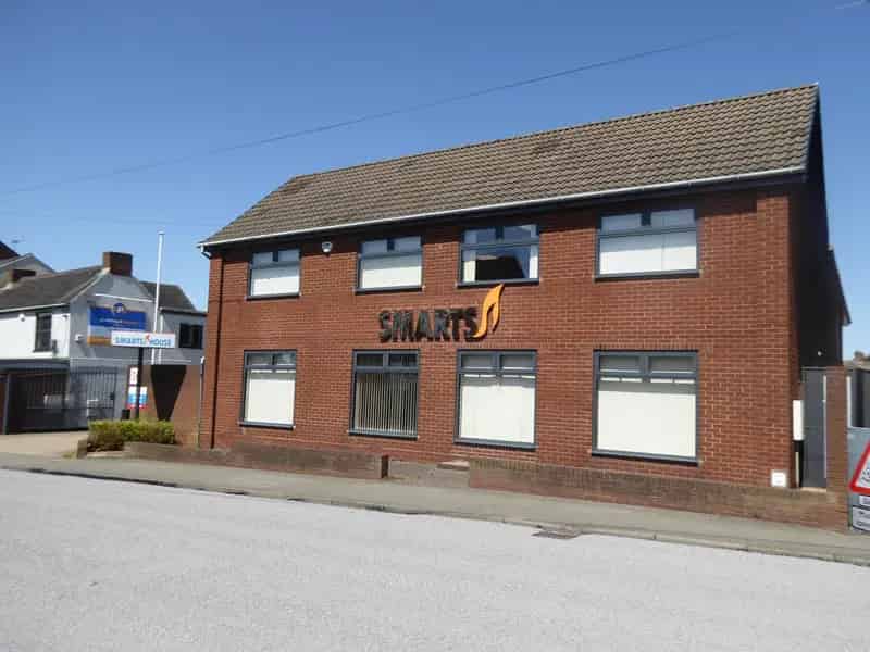 Two Storey Office Building with Storage and Parking
