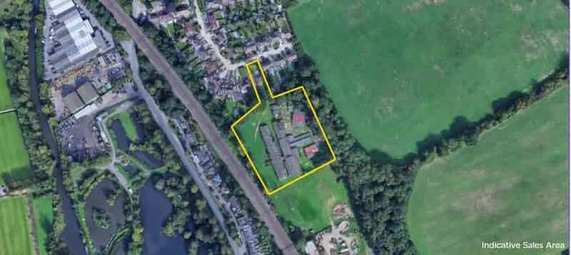 Brownfield Land Redevelopment Opportunity with Existing Buildings