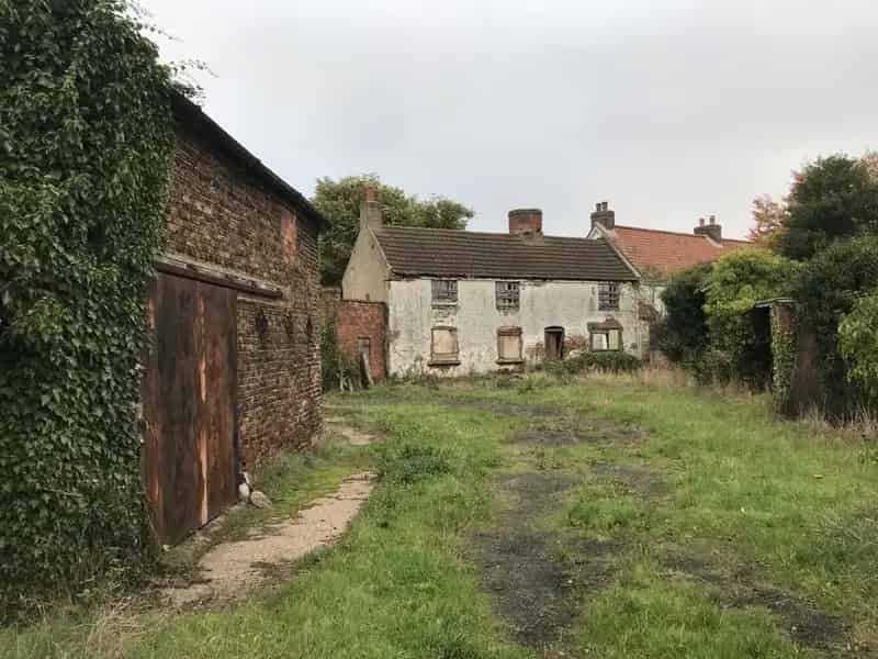 Grade II Listed Cottage with Outbuildings and Redevelopment Potential