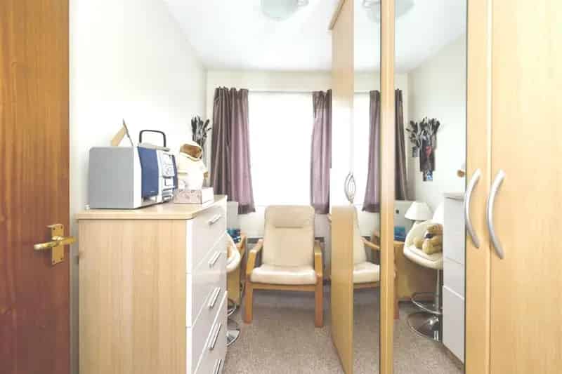 Two-Bedroom Ground Floor Retirement Flat with Modern Wet Room and Parking