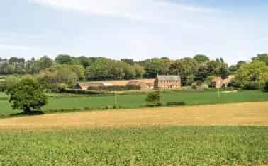 Grade II Listed Farmhouse with Equestrian Facilities and Land