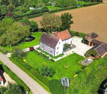 Worcestershire Country Home with Outbuildings and Extensive Gardens