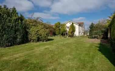 Charming Detached House with Workshop and Gardens