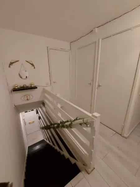 Spacious 1-Bedroom Cottage Flat with Ample Storage and Parking