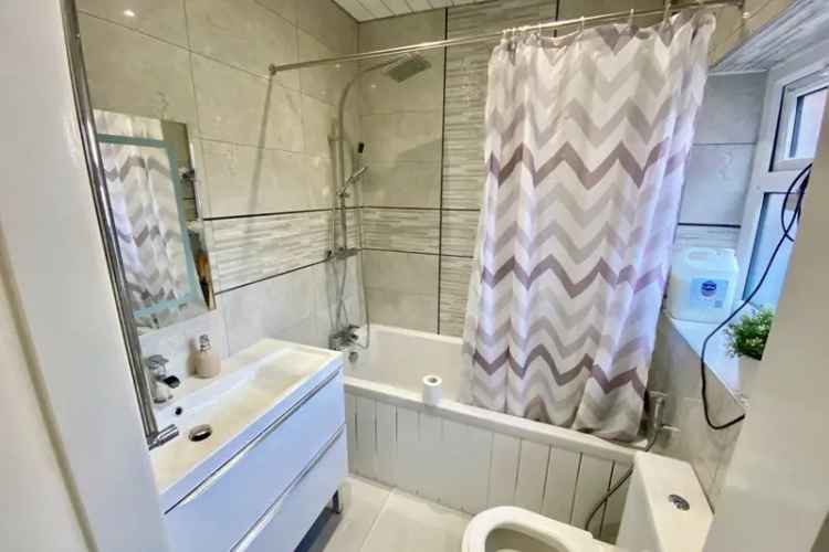 Four Bedroom Mid-Terraced House For Sale