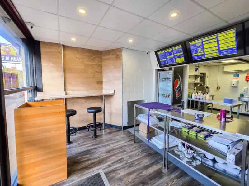 Mid Terrace Building with Retail Unit and Flats - Investment Opportunity